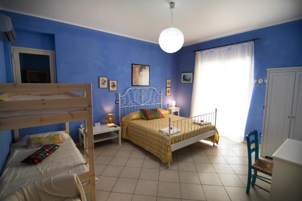 B&B Miroca - Chambre Quadruple Avec Salle De Bain Privée