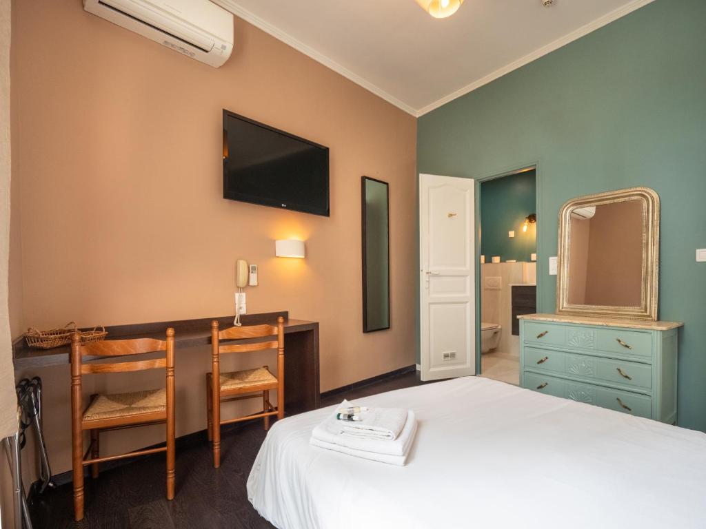 Postel nebo postele na pokoji v ubytování Altera Roma Hôtel