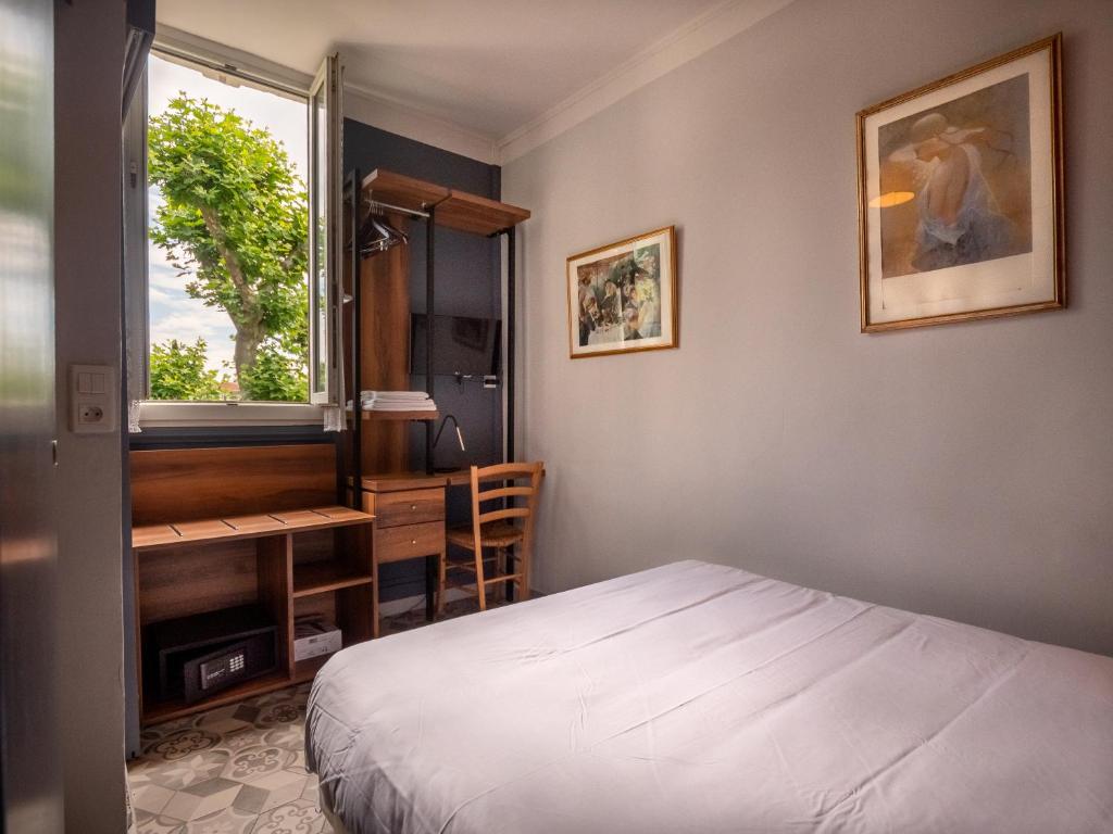 Postel nebo postele na pokoji v ubytování Altera Roma Hôtel