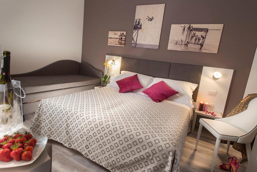 Postel nebo postele na pokoji v ubytování Hotel Marcus