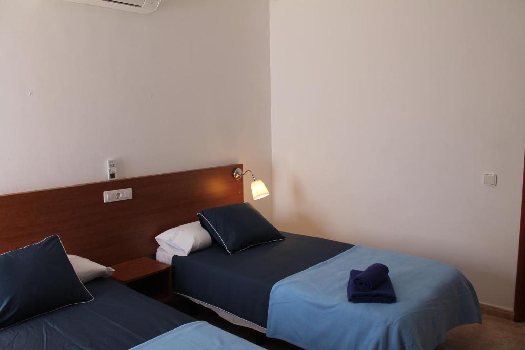 Postel nebo postele na pokoji v ubytování Villas Vistabella