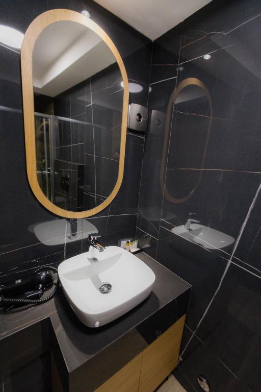 Koupelna v ubytování Hotel Borneo