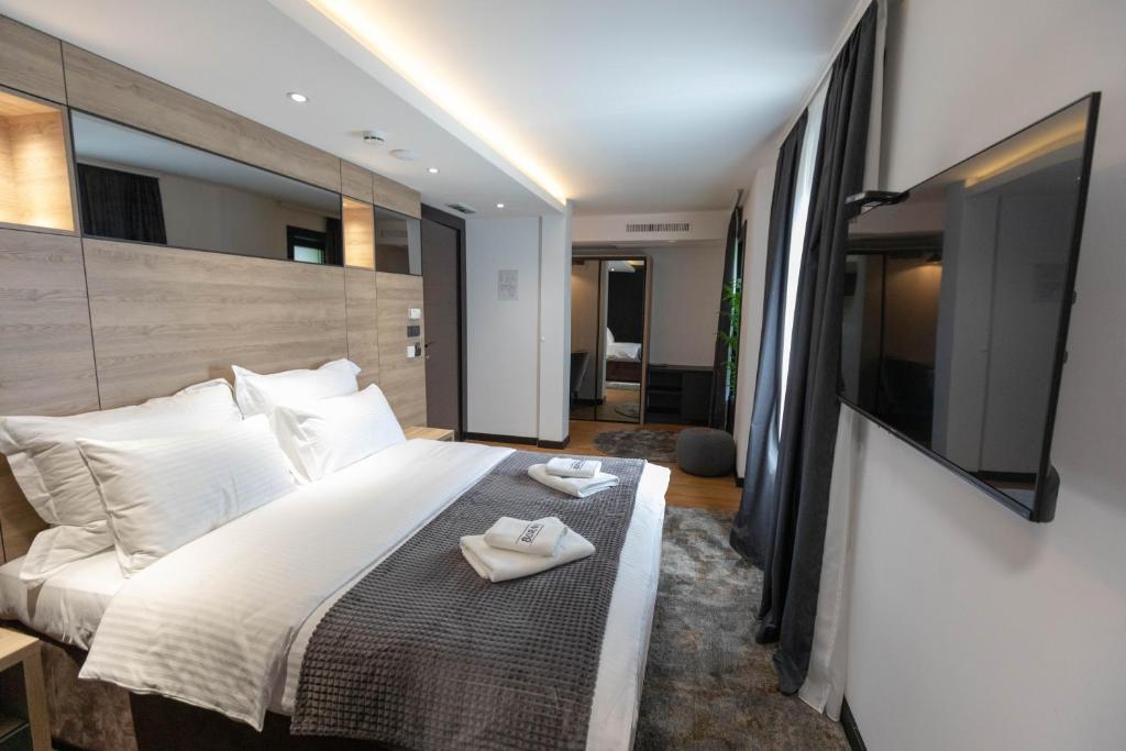 Postel nebo postele na pokoji v ubytování Hotel Borneo