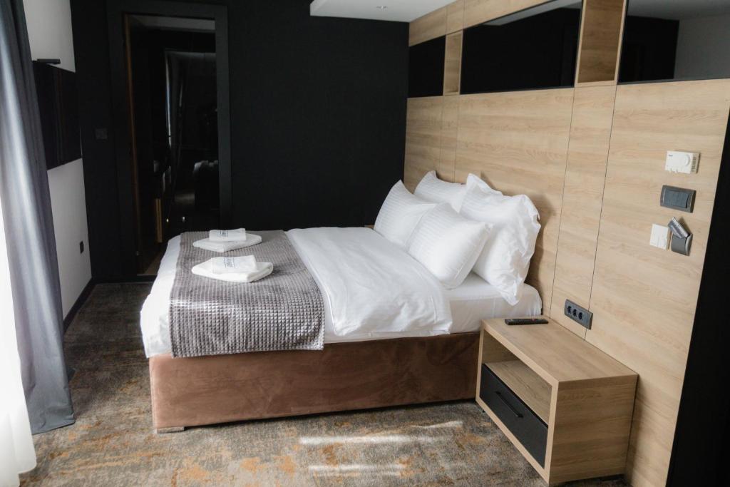 Postel nebo postele na pokoji v ubytování Hotel Borneo