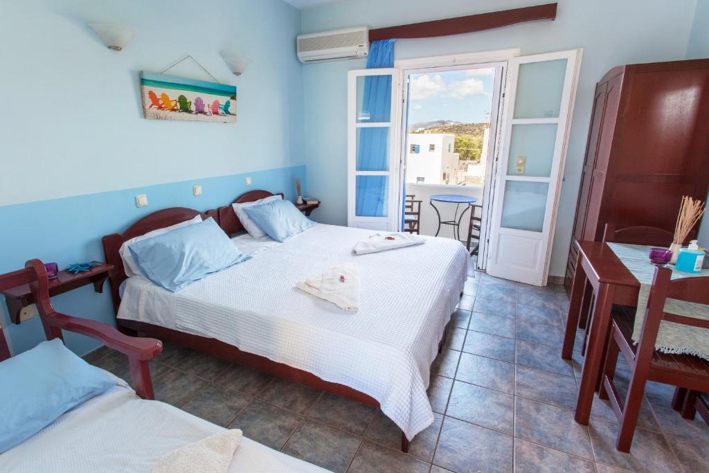 Postel nebo postele na pokoji v ubytování Guesthouse Perdikouli