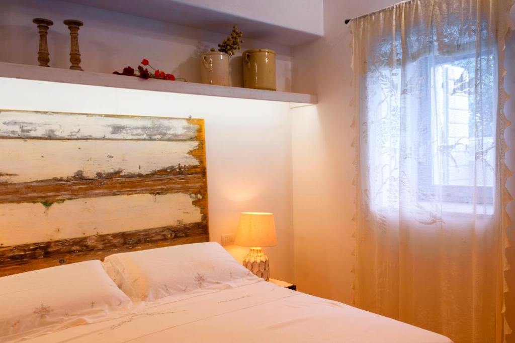 Posteľ alebo postele v izbe v ubytovaní Navolte Trulli e Quiete con Piscina