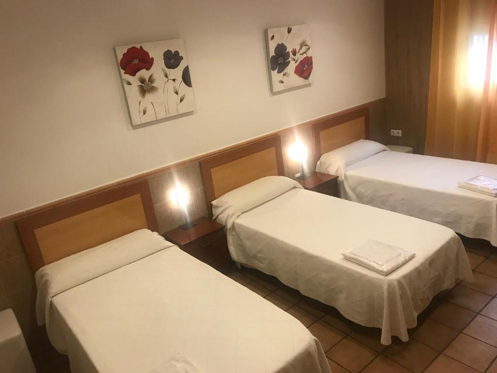Posteľ alebo postele v izbe v ubytovaní El Rento Alojamiento Rural
