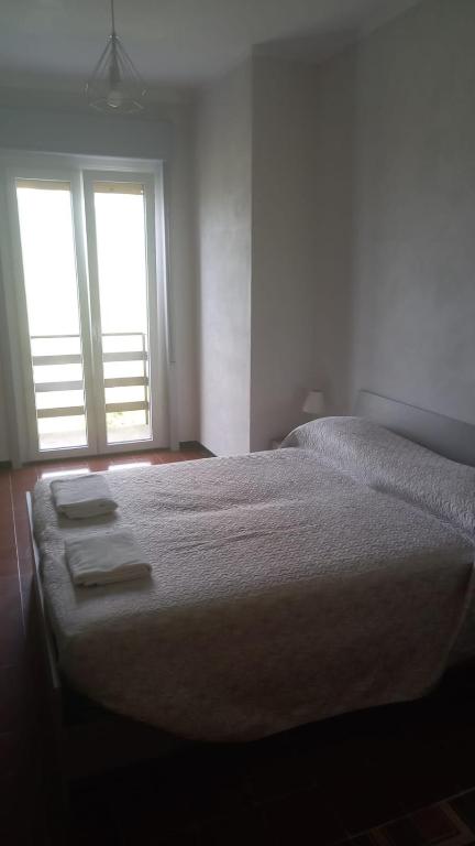 Postel nebo postele na pokoji v ubytování Albergo ristorante Payarin