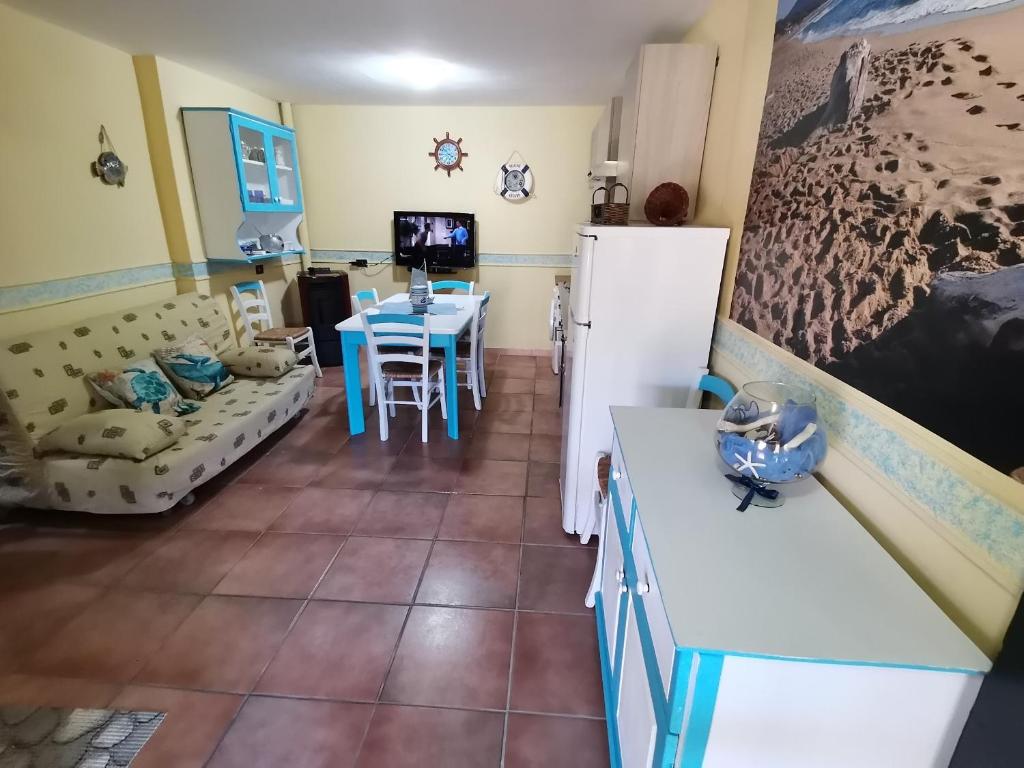 Telewizja i/lub zestaw kina domowego w obiekcie Villetta Sara