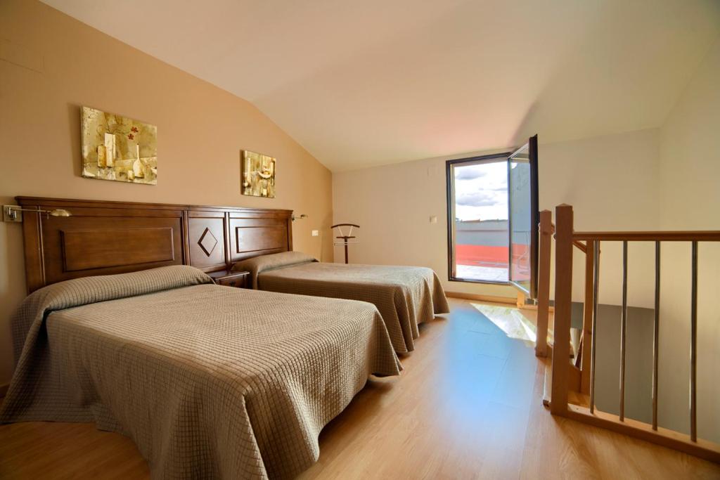 Llit o llits en una habitació de Sierra de Gudar