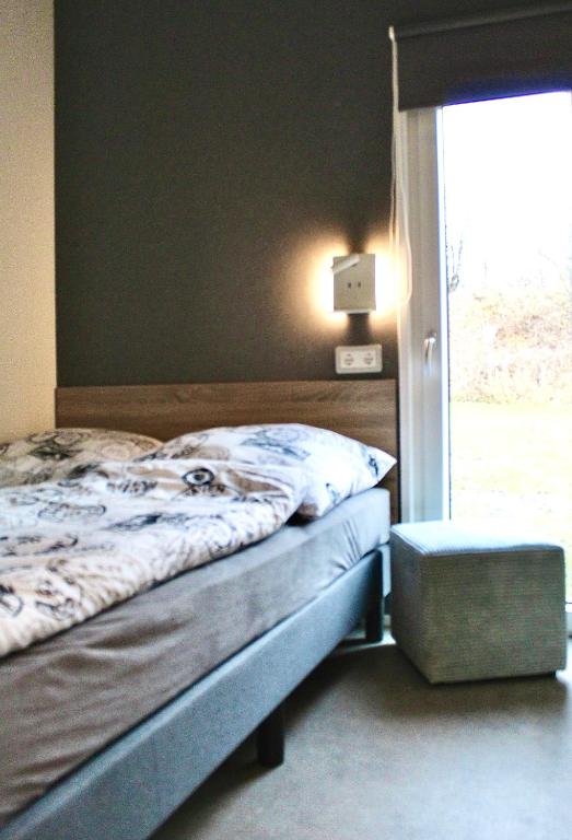 Postel nebo postele na pokoji v ubytování Seaside Lodge Süsel, Lübecker Bucht, Ostsee