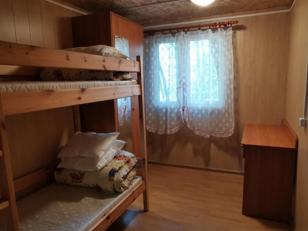 Posteľ alebo postele v izbe v ubytovaní Nova Mazury