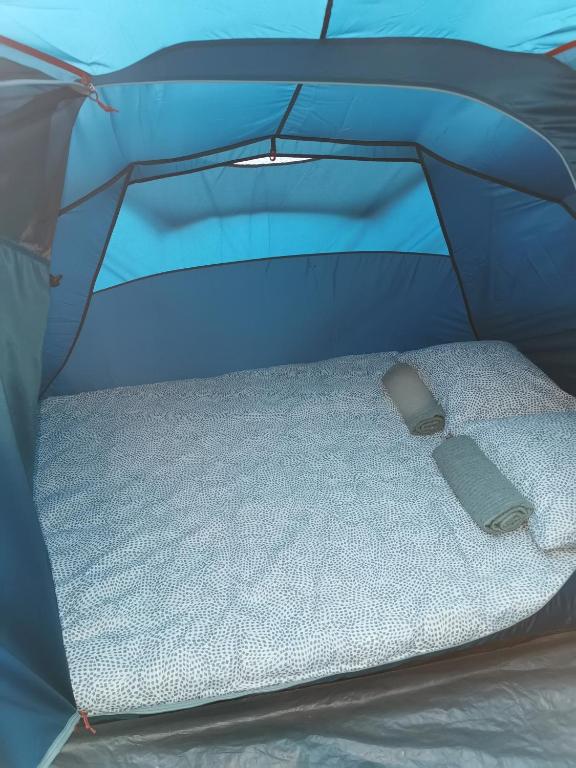 Postel nebo postele na pokoji v ubytování ECO Camp Supot
