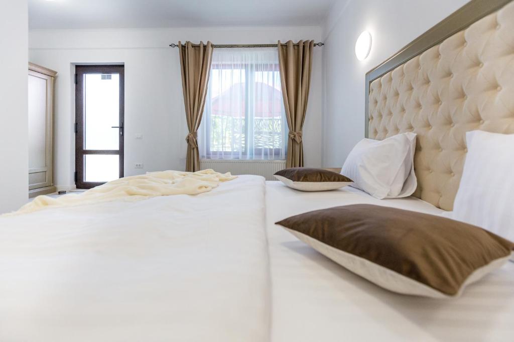 Postel nebo postele na pokoji v ubytování Brize Guesthouse