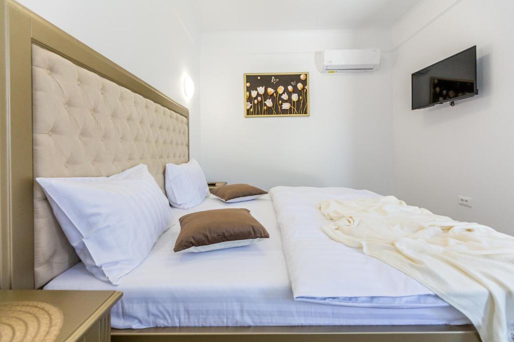 Postel nebo postele na pokoji v ubytování Brize Guesthouse
