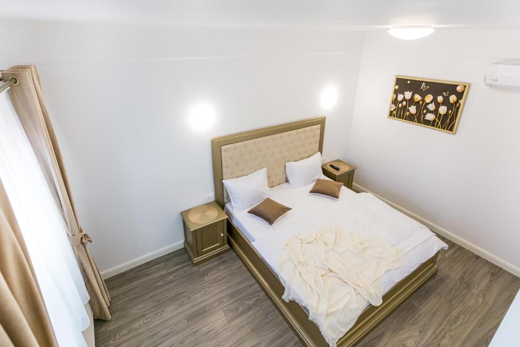 Postel nebo postele na pokoji v ubytování Brize Guesthouse