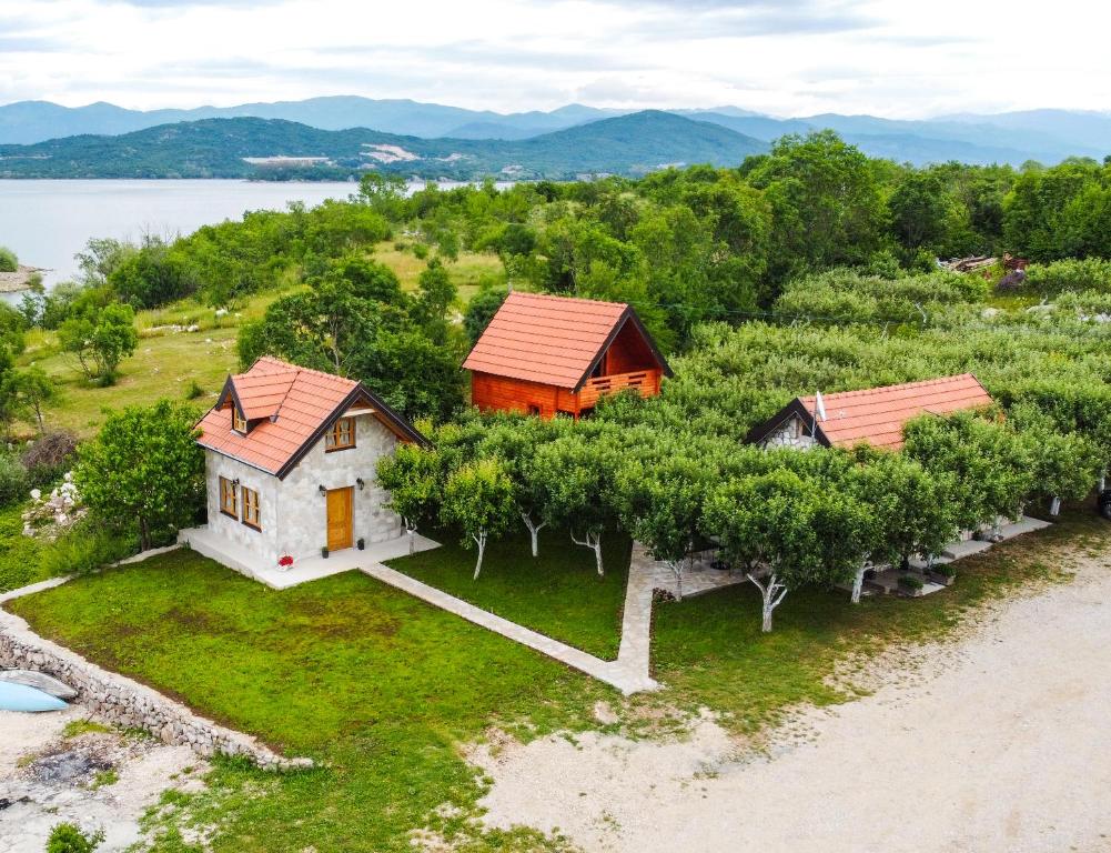 an aerial view of a house on the beach at Apartmani Kod Draskovica in Nikšić