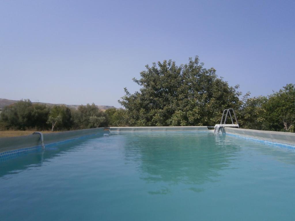 Bazén v ubytovaní Dimore del Carrubo - villa con piscina alebo v jeho blízkosti