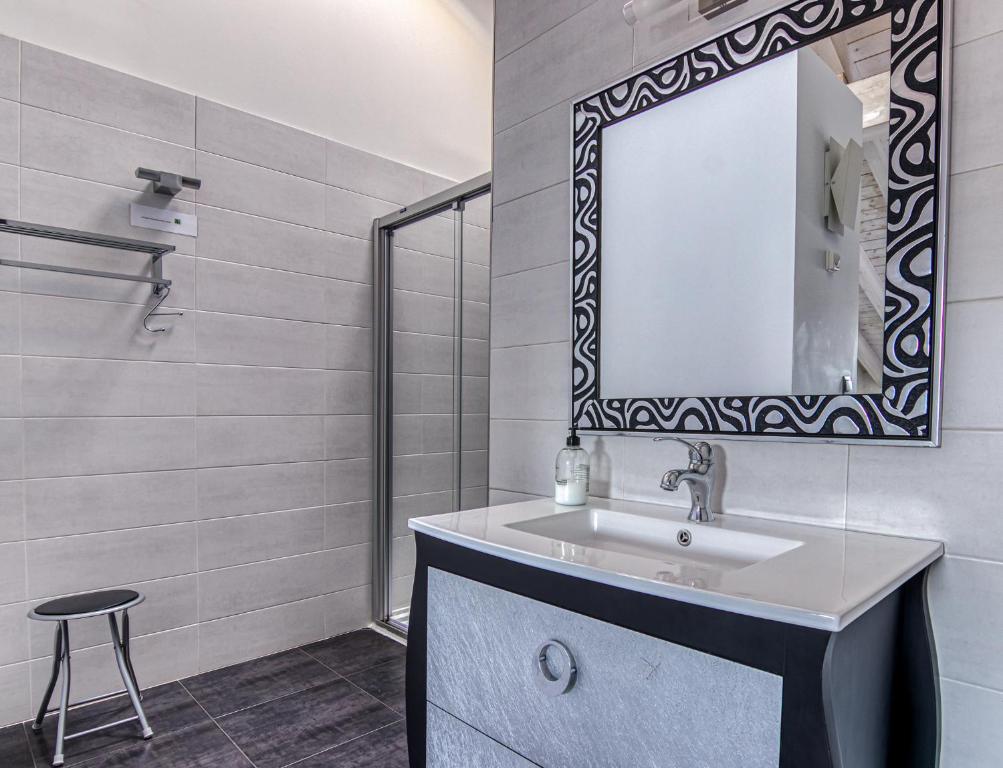 Koupelna v ubytování Apartamentos Cuatro Aguas