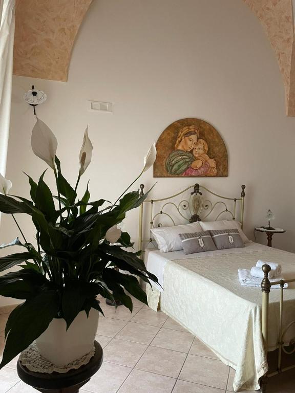 Postel nebo postele na pokoji v ubytování Donna Concetta casa vacanze