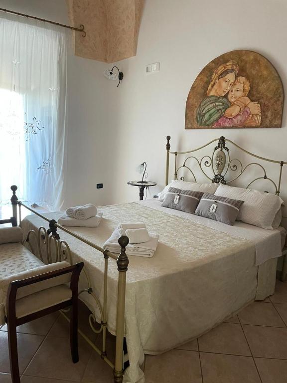 Postel nebo postele na pokoji v ubytování Donna Concetta casa vacanze