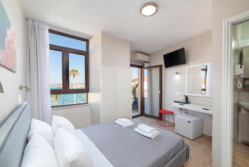 TV a/nebo společenská místnost v ubytování Faros Rooms