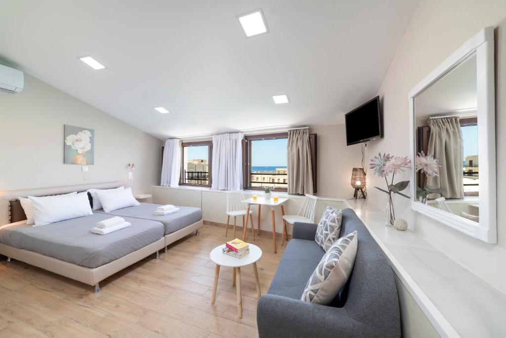 Postel nebo postele na pokoji v ubytování Faros Rooms