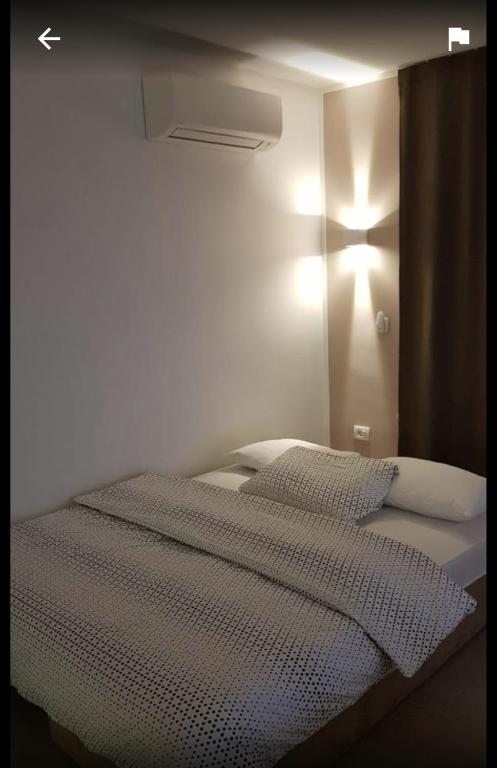 Apartment Luce tesisinde bir odada yatak veya yataklar