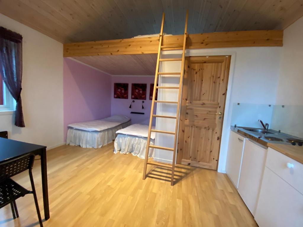 Kuchyň nebo kuchyňský kout v ubytování Visitor Stugby