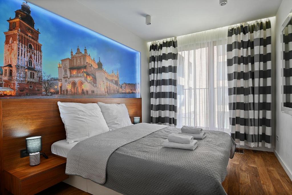 Posteľ alebo postele v izbe v ubytovaní Apartamenty Prestige Browar Lubicz Stare Miasto