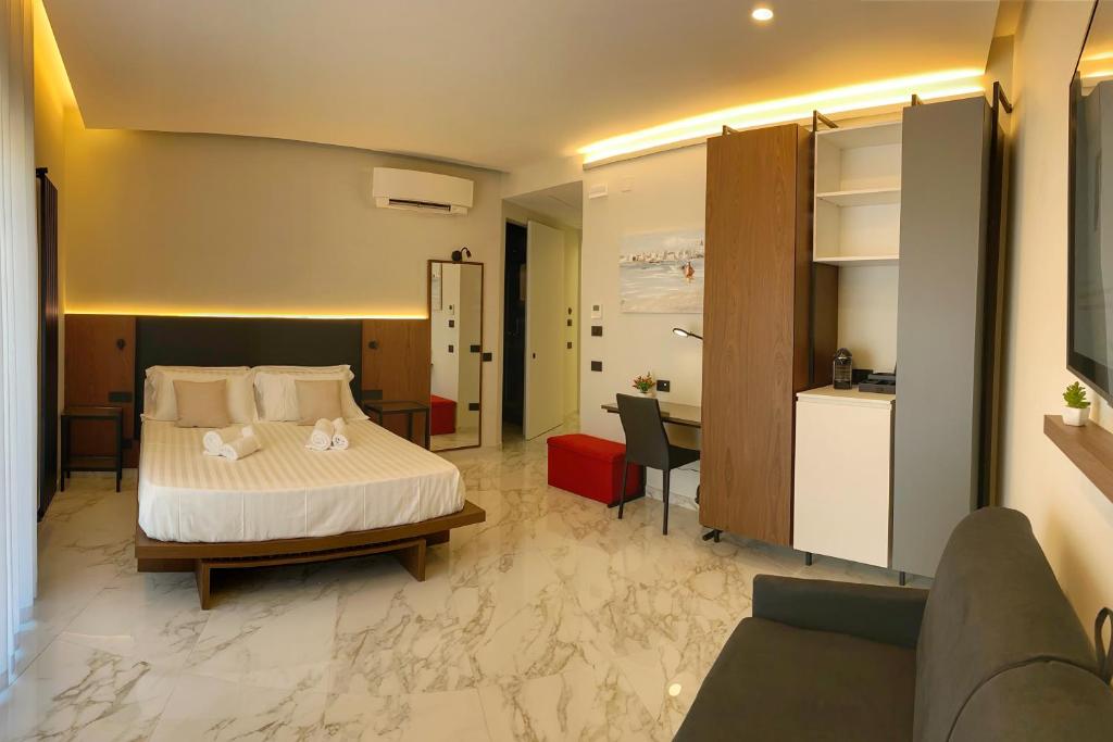 Łóżko lub łóżka w pokoju w obiekcie B&B BorgiaRooms