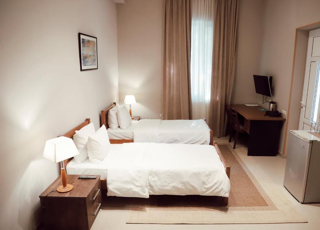 Postel nebo postele na pokoji v ubytování Abastumani Residence