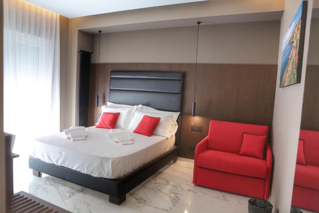 Łóżko lub łóżka w pokoju w obiekcie B&B BorgiaRooms