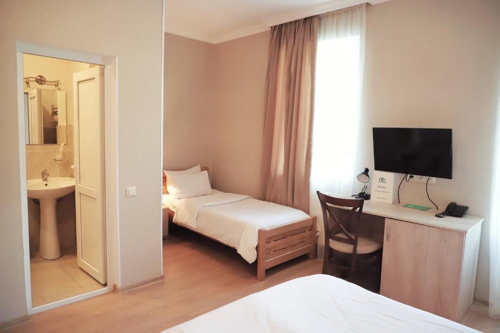 Postel nebo postele na pokoji v ubytování Abastumani Residence