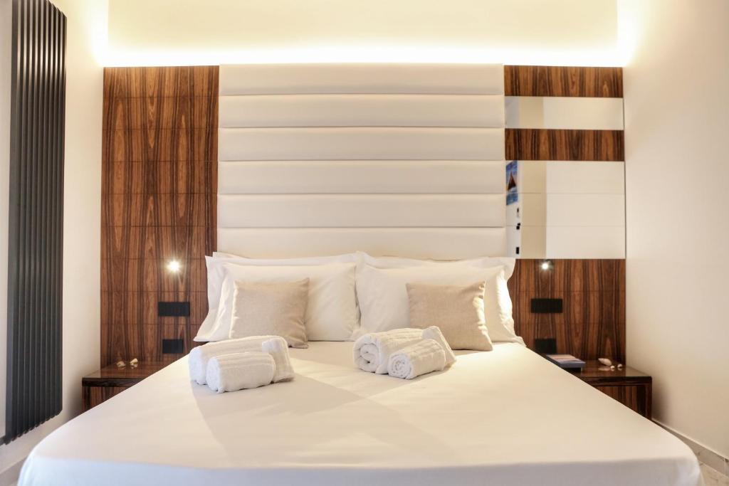 Łóżko lub łóżka w pokoju w obiekcie B&B BorgiaRooms