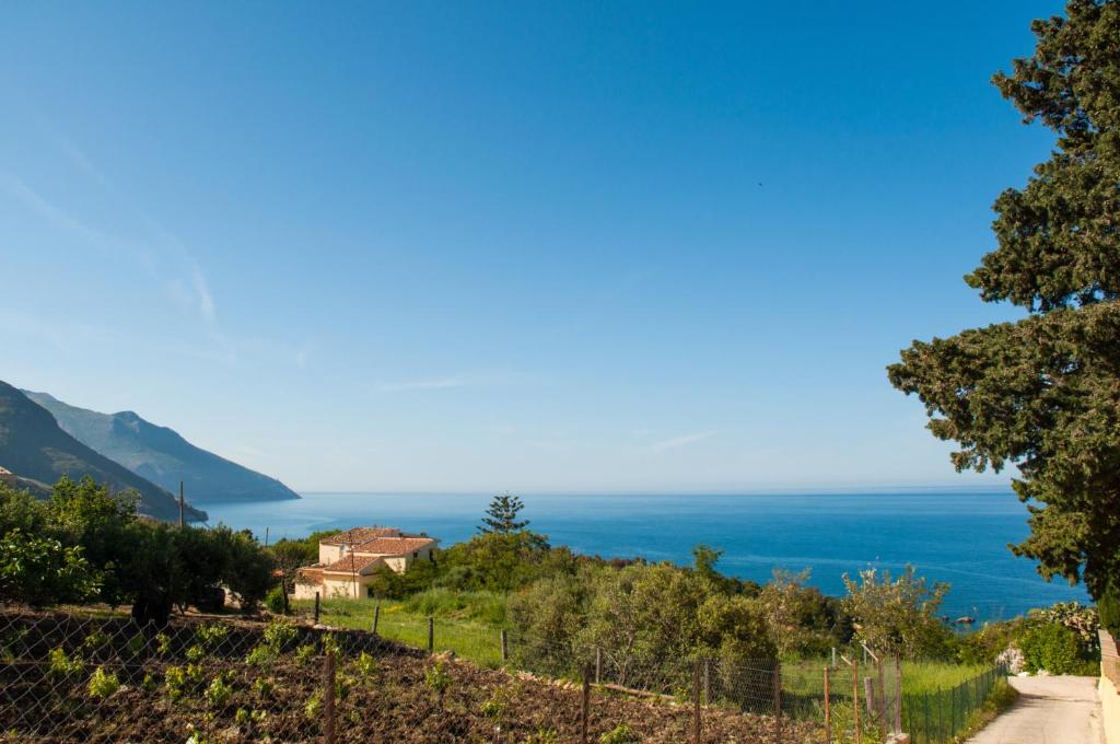 a view of the ocean from a hill at Cialoma Home Holiday in Scopello