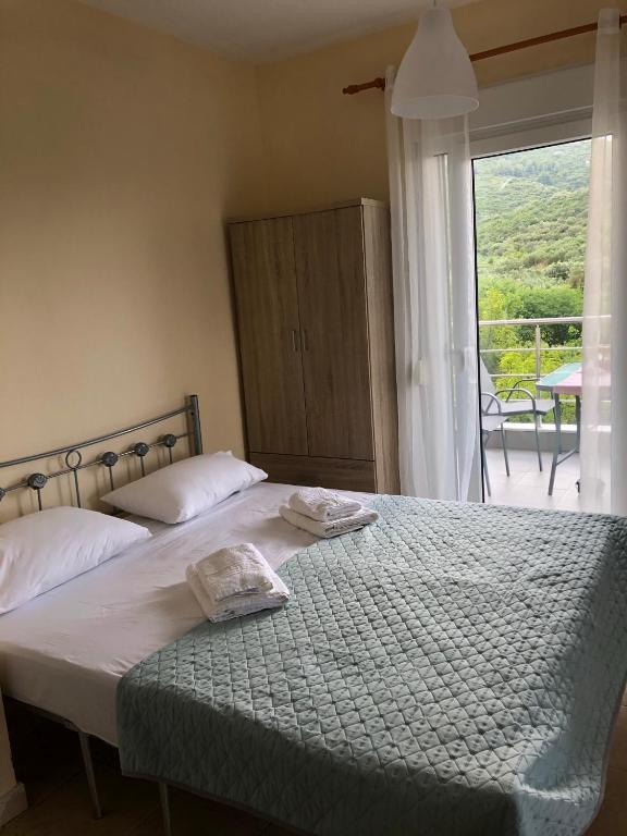 Postel nebo postele na pokoji v ubytování Sofia' s Beach House