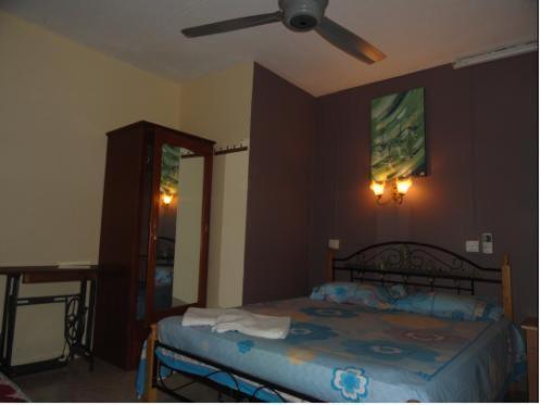 Postel nebo postele na pokoji v ubytování Tyvabro Guesthouse