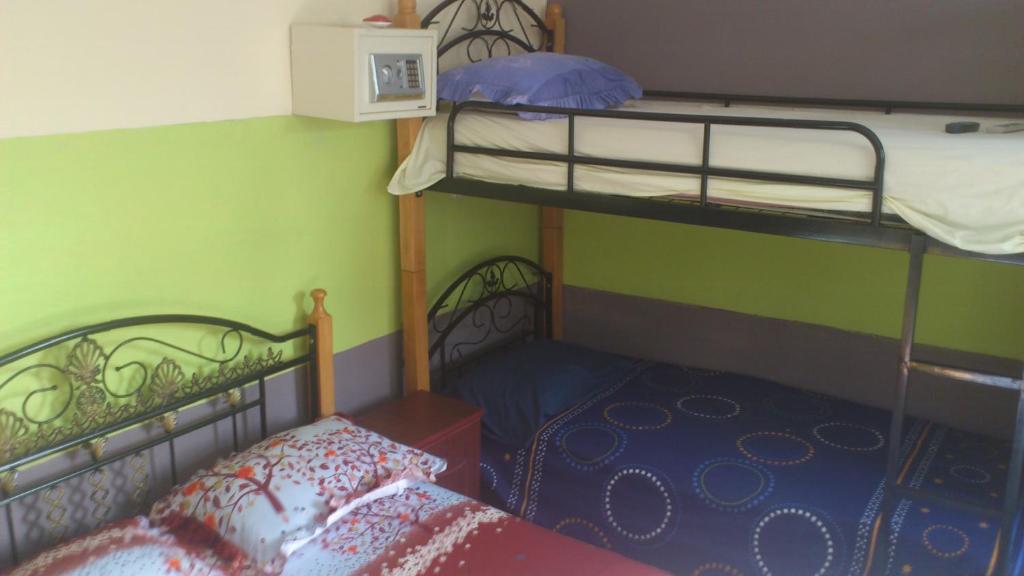 Postel nebo postele na pokoji v ubytování Tyvabro Guesthouse