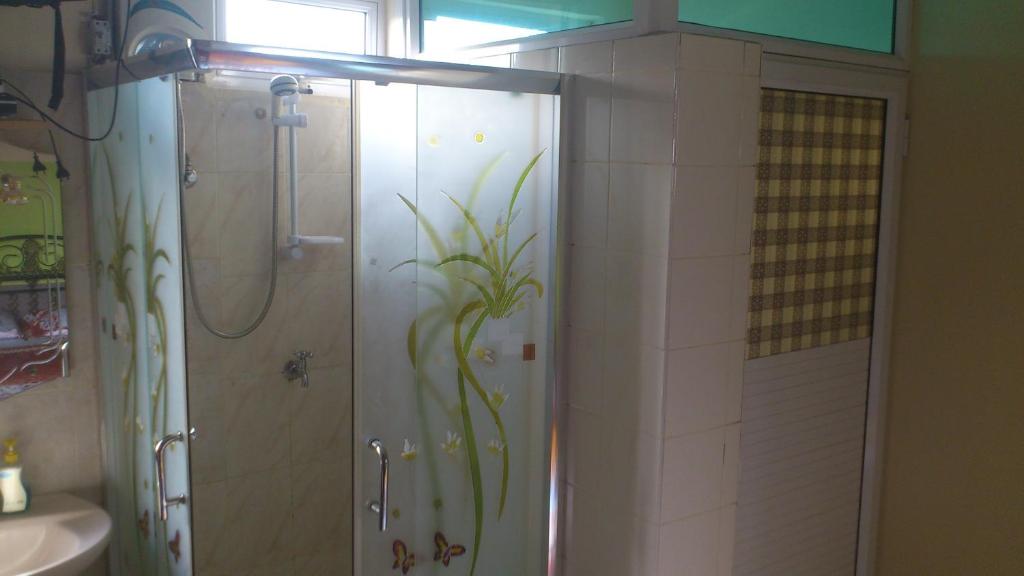 Koupelna v ubytování Tyvabro Guesthouse