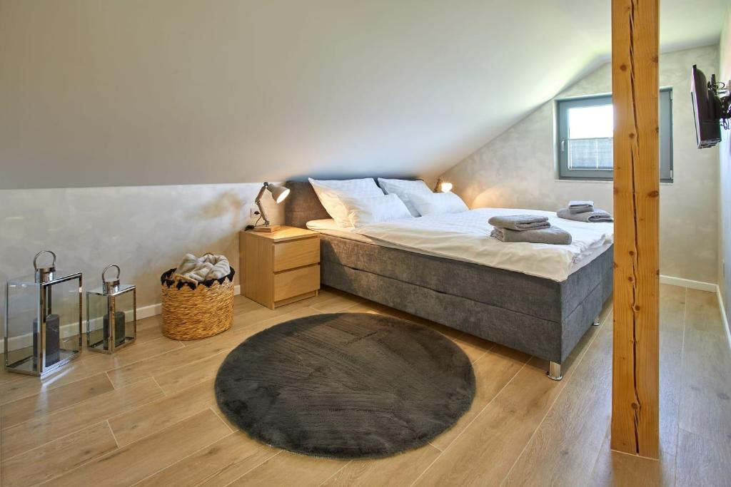 Postel nebo postele na pokoji v ubytování Apartmany pod Pustevnami