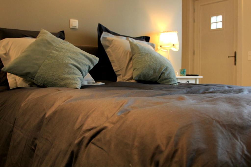 Postel nebo postele na pokoji v ubytování B&B Laurus
