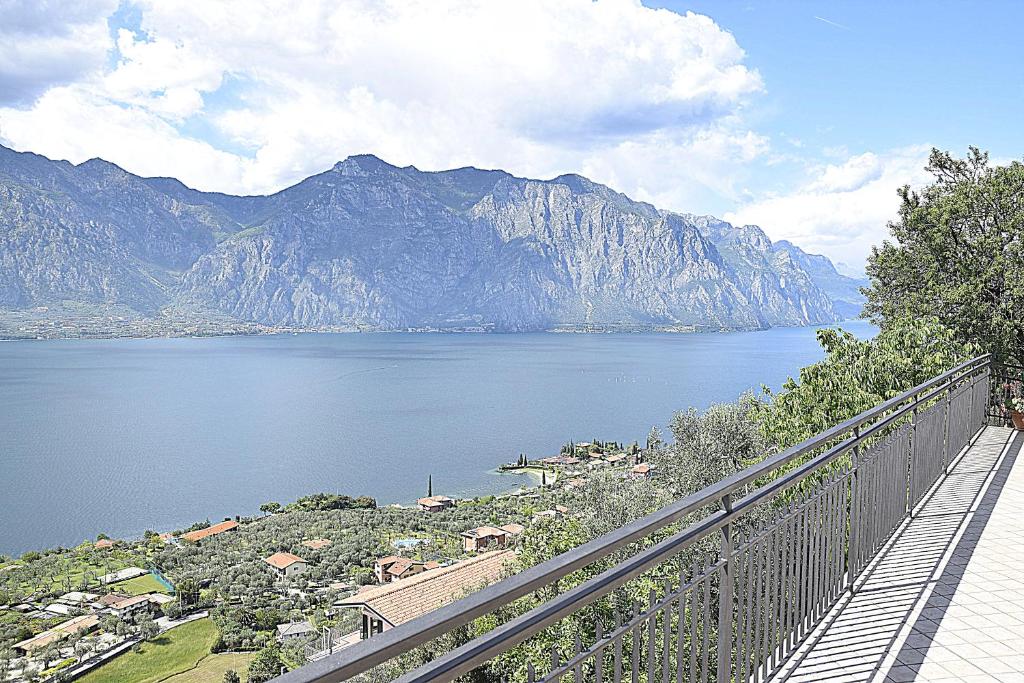 a view of a lake with mountains in the background at La Terrazza sul Lago in Malcesine