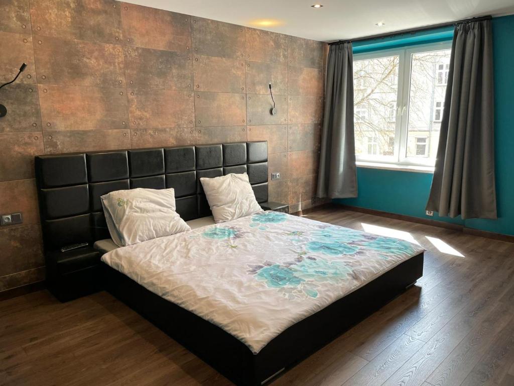 Posteľ alebo postele v izbe v ubytovaní Lux Apartament Sienkiewicza