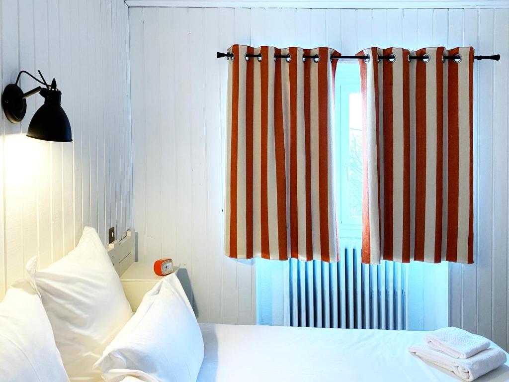 Postel nebo postele na pokoji v ubytování Relais Des Villards