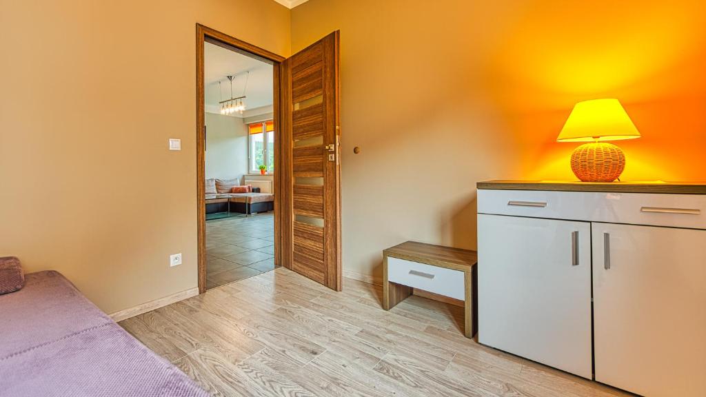 Posteľ alebo postele v izbe v ubytovaní Apartamenty Cicha by Royal Aparts