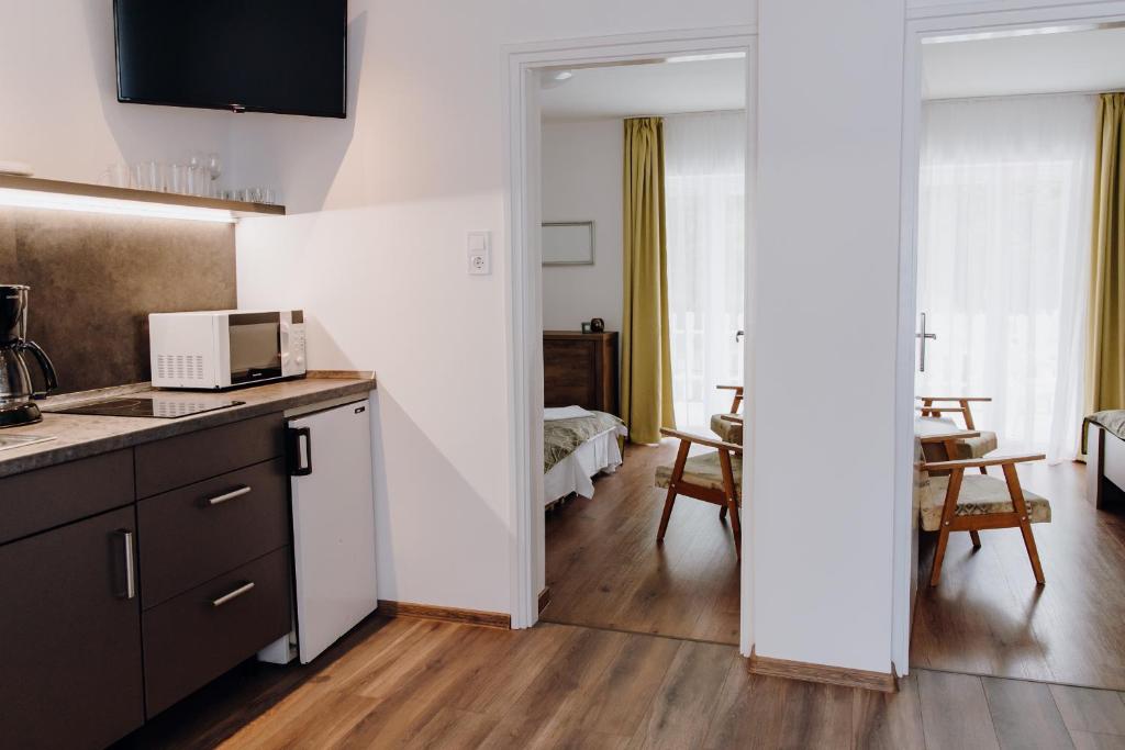 Kuchyň nebo kuchyňský kout v ubytování Nyírfa Apartman