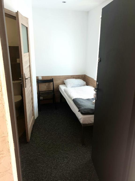 Postel nebo postele na pokoji v ubytování BoomerangHouse
