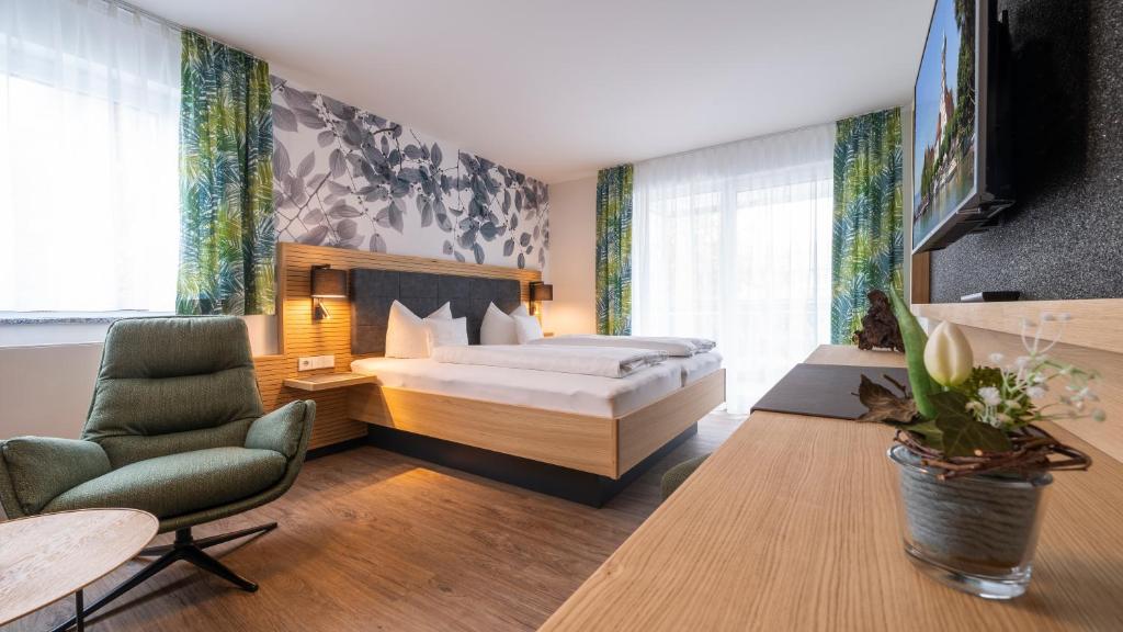 Postel nebo postele na pokoji v ubytování Hotel Lipprandt