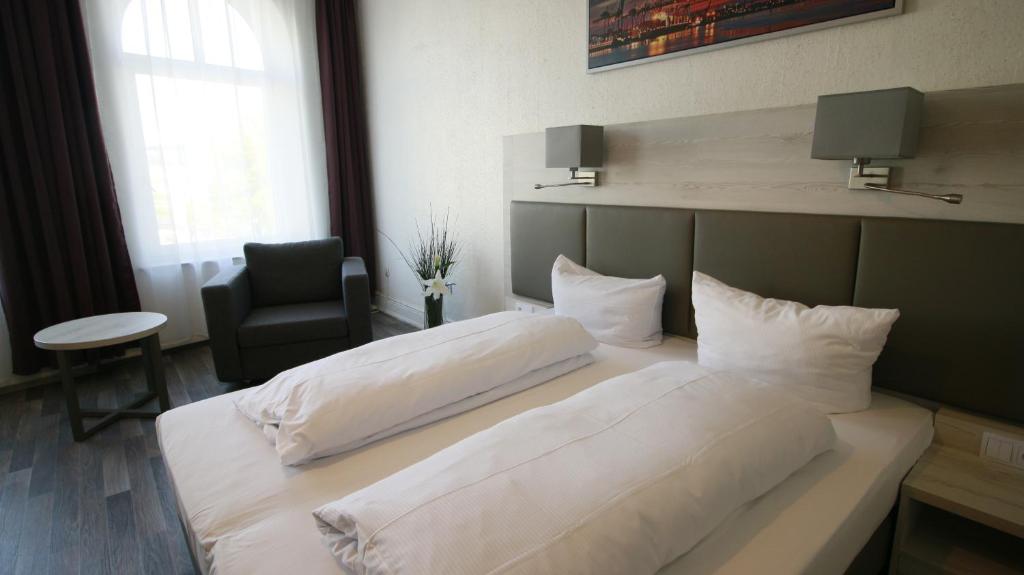Postel nebo postele na pokoji v ubytování Hotel Bee Fang